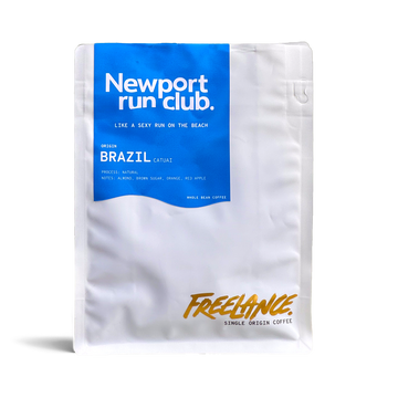 Coffee package with 'Newport run club' branding on a white background